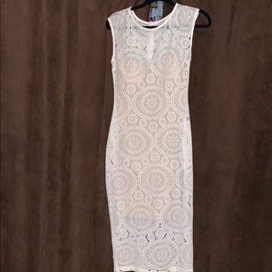 White and nude shortsleeve midi dress.